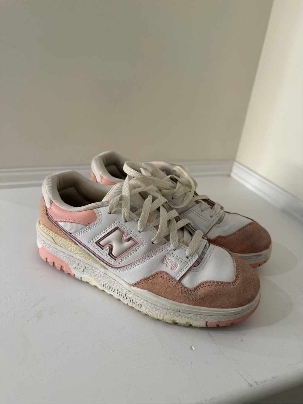 New Balance Kids 550 Sneakers in White and Blush Pink